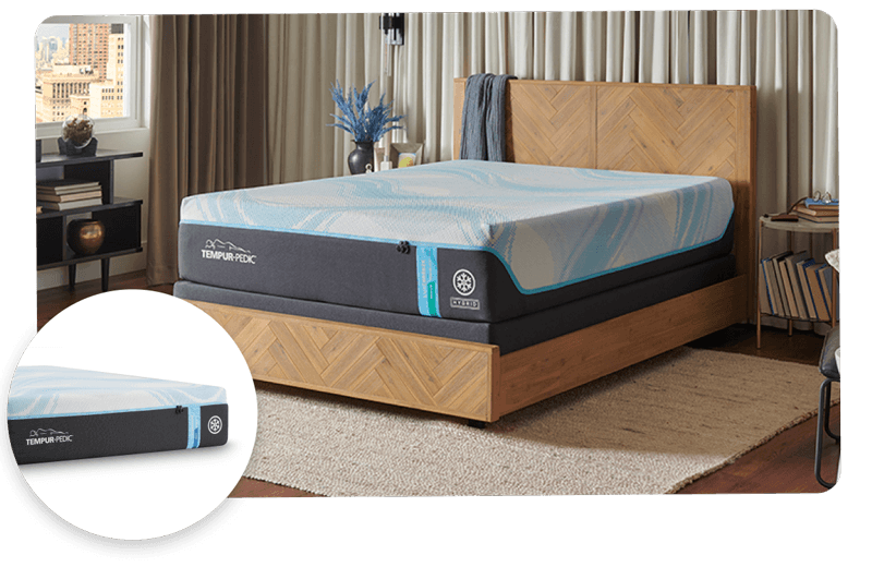 Tempur-Pedic LuxeBreeze mattress on a wooden bed frame