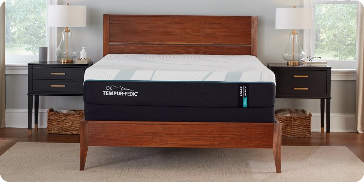 Tempur-Pedic Adapt mattress on a wooden bed frame